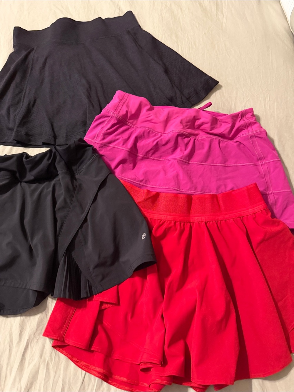 Lululemon Women’s Athletic Skirt Bundle - 2 Black, Hot Pink, Red